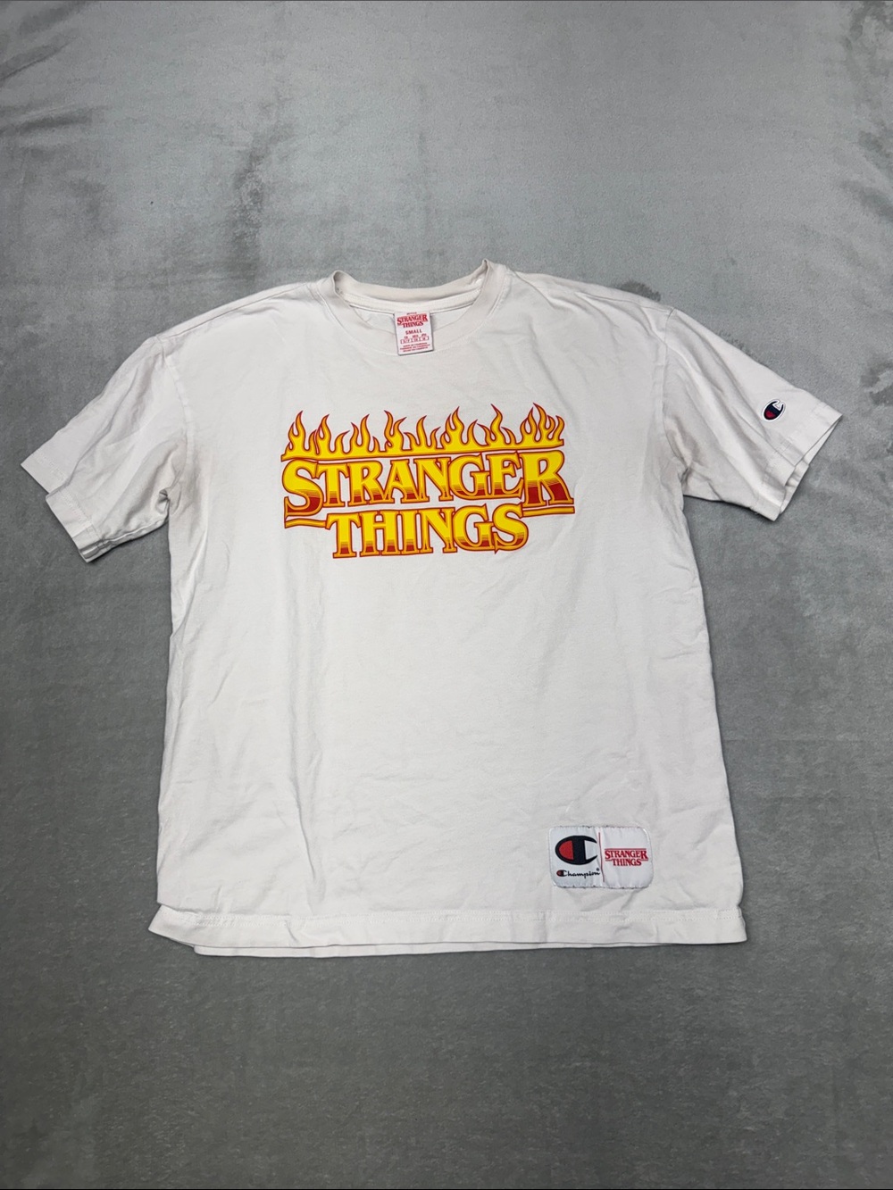 Champion White Tee with Yellow-Orange Flaming 'Stranger Things' Logo